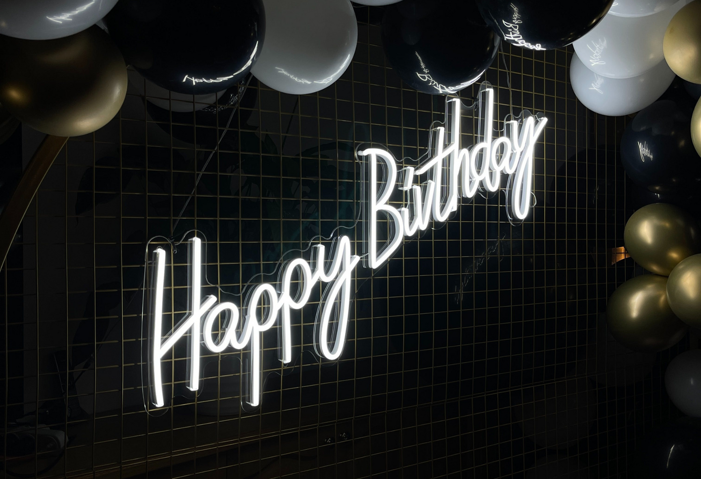 Happy Birthday neon sign with bright, festive LED lights, perfect for party decorations and celebrations