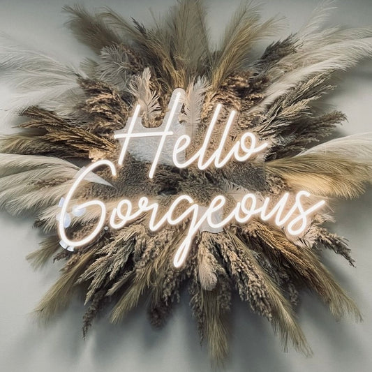 Hello Gorgeous neon sign with elegant script and soft, inviting glow, perfect for salon decor and enhancing ambiance.