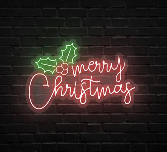 Red and green merry christmas neon sign with holly bush