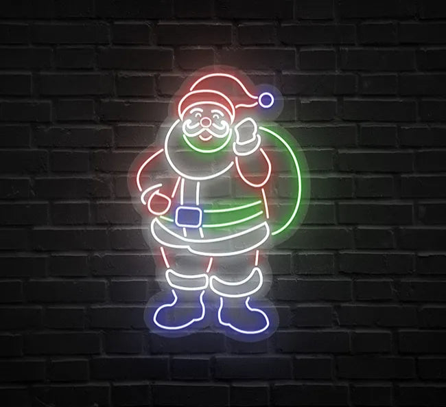 A light up neon sign with santa and his sack