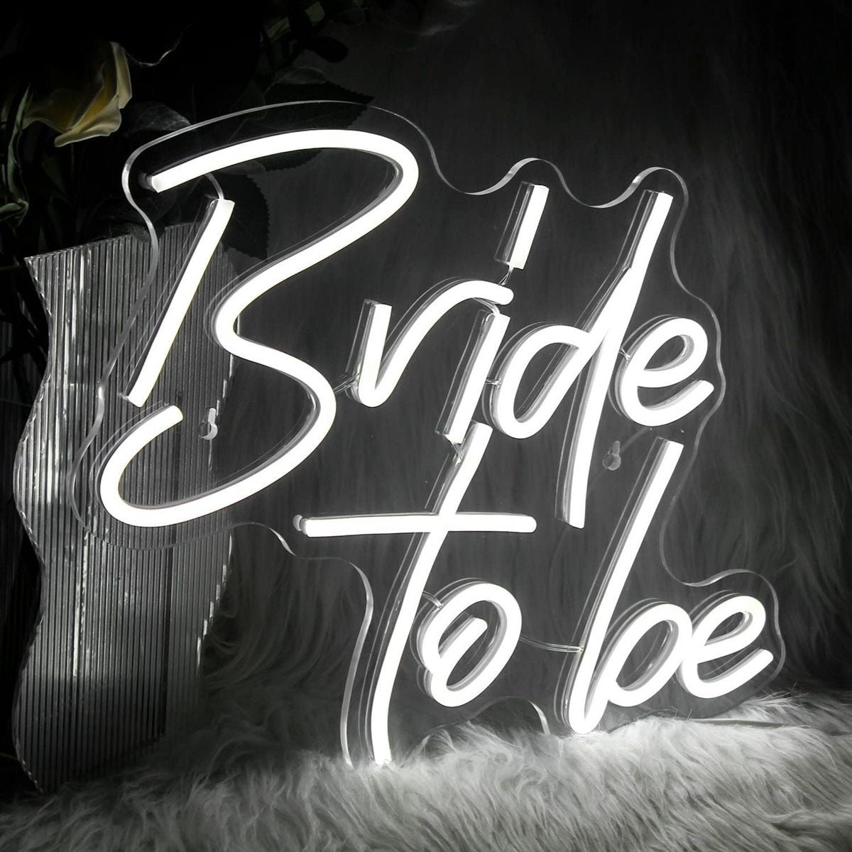 Custom LED 'Bride to Be Wedding Neon Sign' emitting a soft, elegant glow, designed for bridal showers and engagement parties