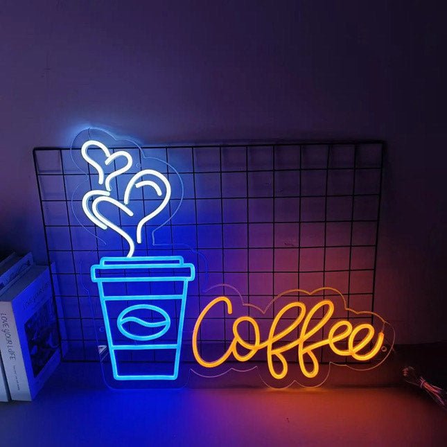 Coffee cup in led neon lighting with love hearts pouring out the lid