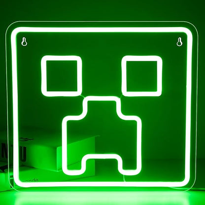 A green neon sign of the creeper from minecraft