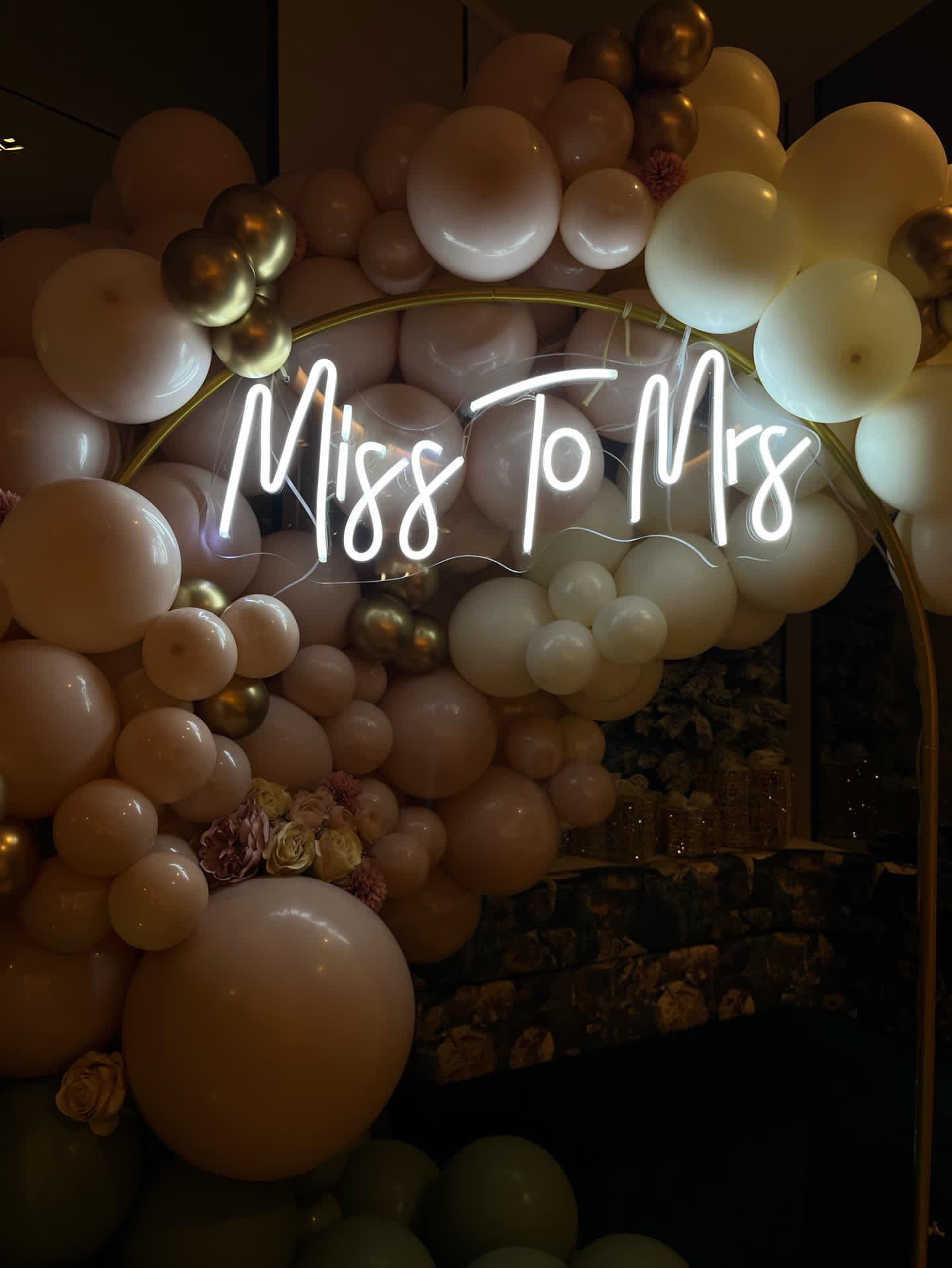 Elegant 'Miss to Mrs' wedding neon sign with bright LEDs, perfect for bridal showers and wedding decor.