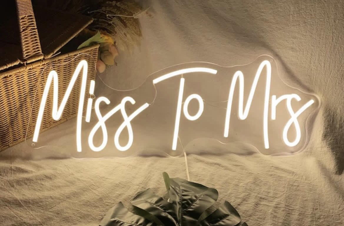 Elegant 'Miss to Mrs' wedding neon sign with bright LEDs, perfect for bridal events and wedding decor.