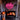 A spooky Halloween neon sign of a ghost in pink 