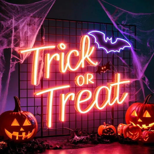trick or treat halloween neon sign in orange neon
